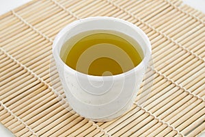 Japanese green tea and cup