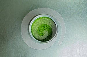 Japanese green tea powder in a can