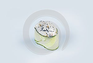 Japanese Gunkan Green Sushi. Kappa nigiri. Tobiko caviar, rice and scallop wrapped in cucumber.