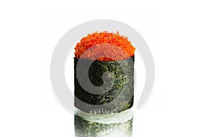 Japanese Gunkan sushi with red flying fish roe tobiko wrapped in nori eaweed isolated on white background with reflection