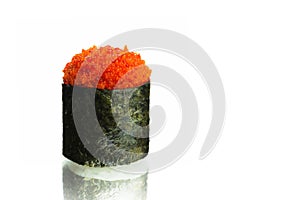 Japanese Gunkan sushi with red flying fish roe tobiko wrapped in nori eaweed isolated on white background with reflection