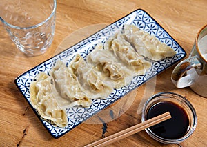 Japanese gyoza dumplings served on platter