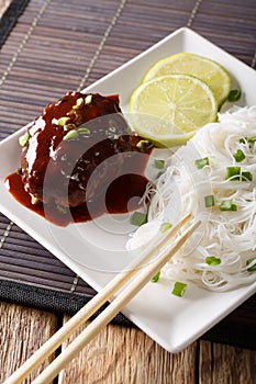 Japanese hamburg steak or hambagu with sauce and rice noodles cl