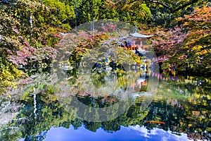 Japanese Heritage. Serene Famous Daigo-ji Temple During Beautiful Red Maples Autumn Season at Kyoto City in Japan. With Pond