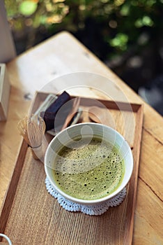 Japanese hot green tea and wire whisk made of bamboo