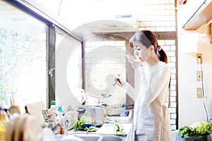 Japanese housewife tasting cooking
