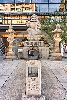 Japanese hyakudo-ishi stone in front of the Daikokuten statue of Kanda Myojin shrine.