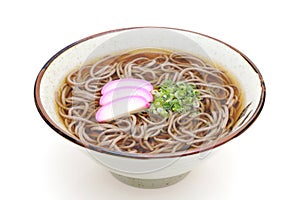 Japanese Kake soba noodles in a ceramic bowl