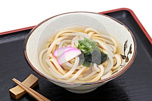 Japanese Kake udon noodles in a ceramic bowl