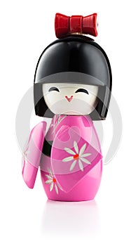 Japanese kokeshi doll on white