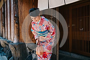 Japanese lady bowing with beautiful kimono