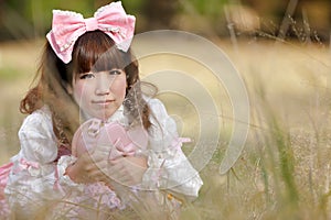 Japanese lolita in meadow