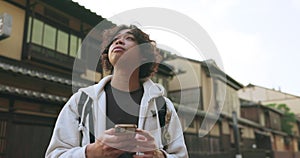 Japanese man, smartphone and travel in city with technology, gps and connection for destination directions. Young person