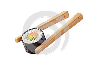 Japanese meal. Chopsticks holding sushi roll with salmon and avocado isolated on white background. Concept of susi