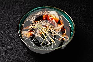 Japanese miso soup on black background