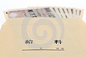 Japanese money in salary envelope