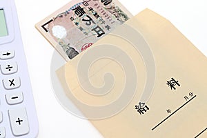 Japanese money in salary envelope