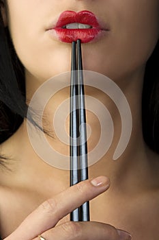 Japanese mouth with chopstick