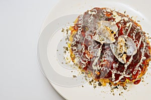 Japanese okonomiyaki on a white background