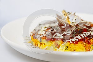 Japanese okonomiyaki on a white background