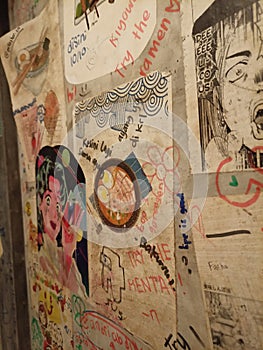 Japanese old paper poster glued on a wall