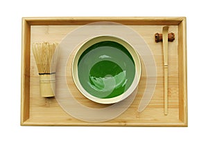 Japanese organic matcha green tea ceremony with bamboo whisk chasen and hooked bamboo scoop chashaku on bamboo tray