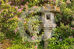 Japanese Pagoda Lantern Within Green Garden Setting