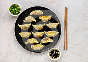 Japanese pan-fried dumplings, Gyoza, are popular weeknight meal as well as a great appetizer for dinner party
