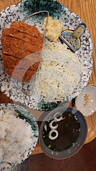 Japanese Pork Katsu Lunch Set Arranged on Dining Table.
