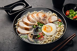 Japanese ramen noodle with chicken, shiitake mushroms and egg in