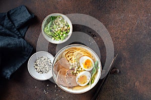 Japanese ramen noodles soup bowl with pork and egg