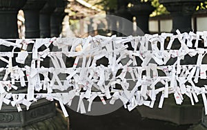 Japanese random fortunes written on strips of paper