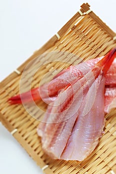 Japanese red fish, kinki fillet on bamboo basket