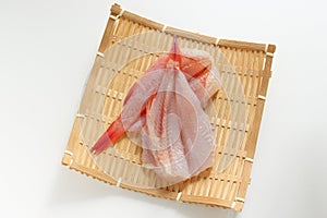 Japanese red fish, kinki fillet on bamboo basket