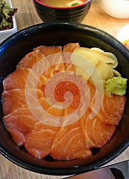 Japanese Rice with Salmon and Tobiko Salmon Don served with Wasabi and Prickled Ginger with Miso Soup, Salmon roe bowl.