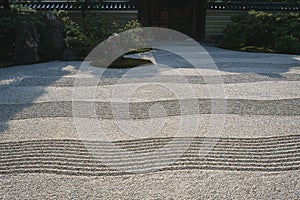 Japanese Rock Garden or `dry landscape` garden Background, in the Zen Buddhism Temple of Kenninji, Kyoto, Japan