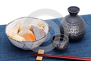 Japanese sake cup and bottle with oden