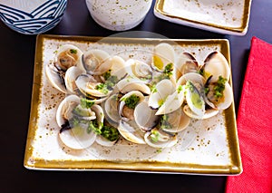 Japanese sake steamed clams with garlic and green onions