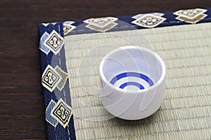 Japanese sake in traditional ceramic cup