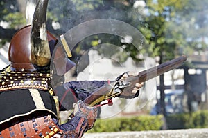 Japanese samurai with fire lock rifle