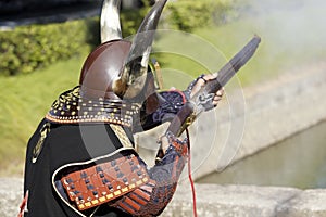Japanese samurai with fire lock rifle