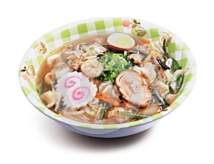 Japanese seafood ramen noodle soup with chashu and vegetables
