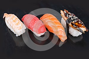 Japanese seafood sushi, on black background