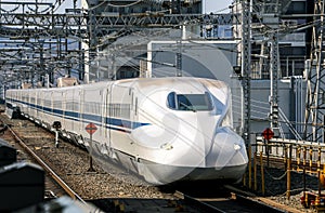 Japanese shinkansen bullet train standing in railway station