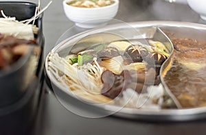 Japanese Shittake Mushrooms in a Shabu Shabu Hot Pot photo