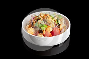 Japanese shrimps salad Ebi salad in bowl on a black background with reflection.