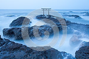 Japanese shrine gate and sea at Oarai city