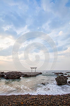 Japanese shrine gate and sea at Oarai city photo