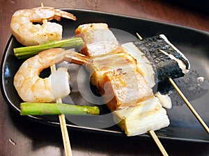 Japanese skewered seafoods photo