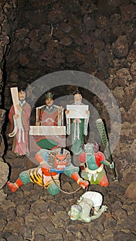 Japanese statues in cave of Kosanji Temple in Japan